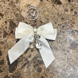 Elegant Cream Bow Keychain